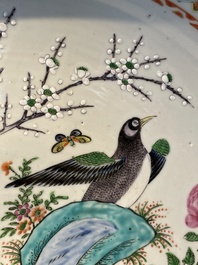A Chinese famille verte and a famille rose dish with birds among blossom branches, 19th C.