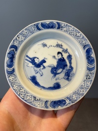 A Chinese blue and white vase, a covered bowl and six saucers, Chenghua and artemisia leaf mark, Kangxi