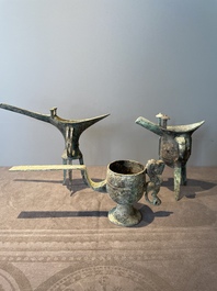 Three Chinese archaic bronze wine vessels, Zhou or later