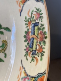 A Chinese famille verte and a famille rose dish with birds among blossom branches, 19th C.