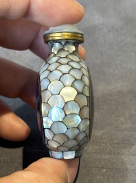Two Chinese lacquered and mother-of-pearl-inlaid snuff bottles and a carved mother-of-pearl shell snuff bottle, Qianlong mark, 18/19th C