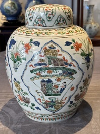A Chinese famille verte 'figures and antiquities' jar and cover, Kangxi