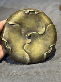 A Chinese bronze tripod censer with cover and stand, 19th C.