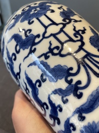 A Chinese blue and white garniture of five vases with lotus scrolls, 19th C.