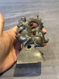 A large bronze sculpture and an opium weight in shape of Hintha or Hamsa, Burma/India, 17/18th C.
