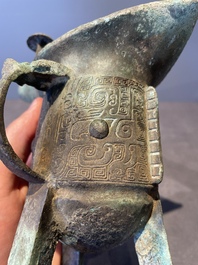 Three Chinese archaic bronze wine vessels, Zhou or later