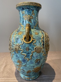 A pair of Chinese robin's egg and faux bronze-glazed 'hu' vases, Qianlong mark, 19th C.