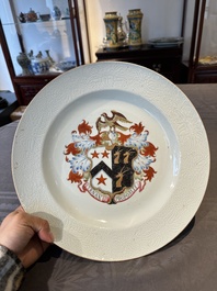 A Chinese famille rose armorial dish with incised rim for the English market with the arms of Willes Impaling Broster, Qianlong