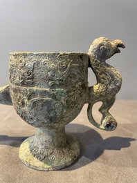 Three Chinese archaic bronze wine vessels, Zhou or later