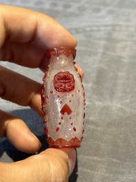 A group of six Chinese overlay glass snuff bottles, 19th C.