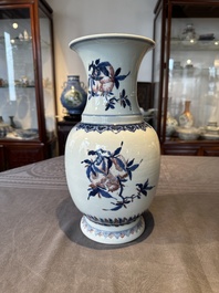 A Chinese blue, white and copper-red 'Three abundances' or 'Sanduo' vase, 19/20th C.