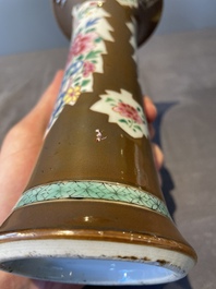 A Chinese capucin-brown-ground famille rose garniture of five vases with floral design, Qianlong