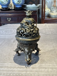 A fine Chinese tripod 'elephant' censer and cover, Ming