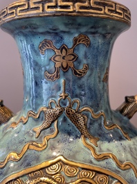 A pair of Chinese robin's egg and faux bronze-glazed 'hu' vases, Qianlong mark, 19th C.