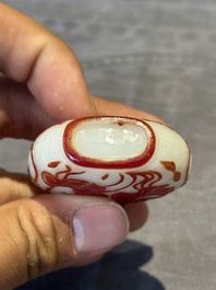 A group of six Chinese overlay glass snuff bottles, 19th C.