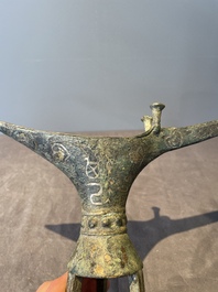 Three Chinese archaic bronze wine vessels, Zhou or later