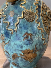 A pair of Chinese robin's egg and faux bronze-glazed 'hu' vases, Qianlong mark, 19th C.