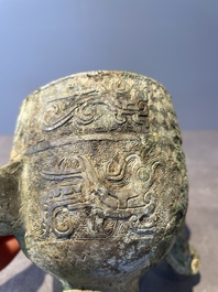 Three Chinese archaic bronze wine vessels, Zhou or later
