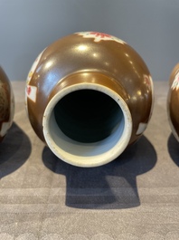 A Chinese capucin-brown-ground famille rose garniture of five vases with floral design, Qianlong