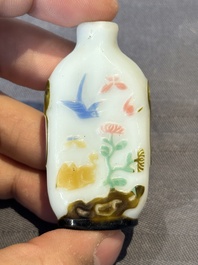 Four Chinese Peking glass snuff bottles, one with a Qianlong mark, 18/19th C.