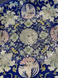 A Chinese blue, white and famille rose tea service, three famille rose bowls, a plate and a covered jar, 19th C.