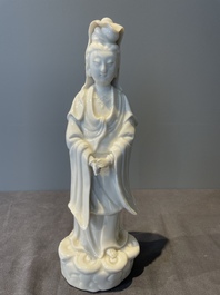 Two Chinese Dehua blanc de Chine figures of Guanyin, 18th C.