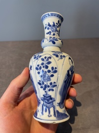 A Chinese blue and white vase, a covered bowl and six saucers, Chenghua and artemisia leaf mark, Kangxi