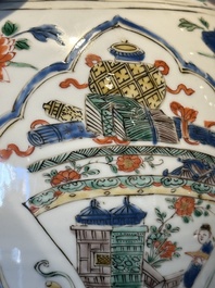A Chinese famille verte 'figures and antiquities' jar and cover, Kangxi