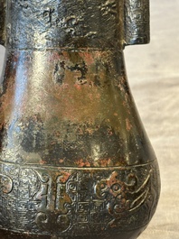 Four Chinese archaistic gilt bronze vases, Yuan/Ming