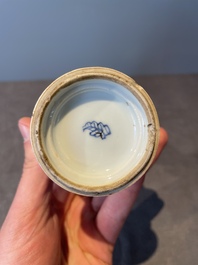 A Chinese blue and white vase, a covered bowl and six saucers, Chenghua and artemisia leaf mark, Kangxi