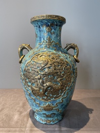 A pair of Chinese robin's egg and faux bronze-glazed 'hu' vases, Qianlong mark, 19th C.
