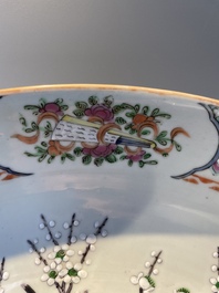 A Chinese famille verte and a famille rose dish with birds among blossom branches, 19th C.