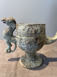 Three Chinese archaic bronze wine vessels, Zhou or later