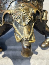 A fine Chinese tripod 'elephant' censer and cover, Ming