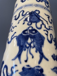 A Chinese celadon-ground slib design 'dragon' vase and Chinese blue and white vase or incense container, 19th C.