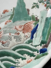 A Chinese famille verte 'leaping carps' dish, artemisia leaf mark, Kangxi