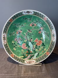 A Chinese famille verte and a famille rose dish with birds among blossom branches, 19th C.