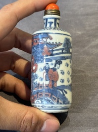 A Chinese blue, white and copper-red snuff bottle, Kangxi mark, 19th C.