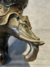 A fine Chinese tripod 'elephant' censer and cover, Ming