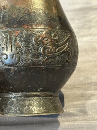 Four Chinese archaistic gilt bronze vases, Yuan/Ming