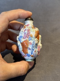 Six Chinese moulded famille rose snuff bottles, Qianlong mark, 19th C.