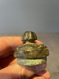 A varied collection of five Chinese bronze objects, 4th C. B.C./15th C.