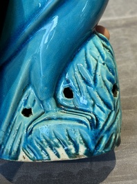 A pair of Chinese turquoise-glazed parrots, 19th C.