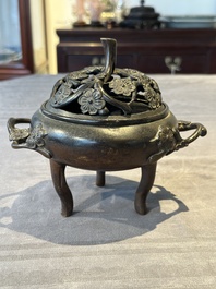 Two Chinese Chinese bronze cylindrical incense stick holders and a covered censer, Yuan/Ming and Qing