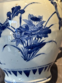A Chinese blue and white vase with floral design and two handles, Transitional period