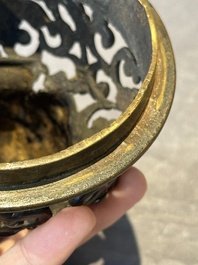 A fine Chinese tripod 'elephant' censer and cover, Ming