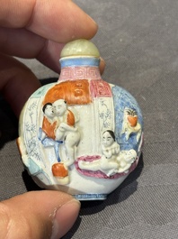 Eight Chinese moulded famille rose snuff bottles, Qianlong mark, 19th C.