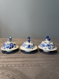 A Chinese blue and white garniture of five vases with lotus scrolls, 19th C.
