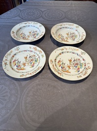 Four Chinese famille rose 'ladies playing music with children' plates, Qianlong