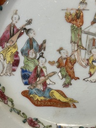 Four Chinese famille rose 'ladies playing music with children' plates, Qianlong